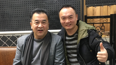 校长林羽龙与著名艺术家黄宏老师合影