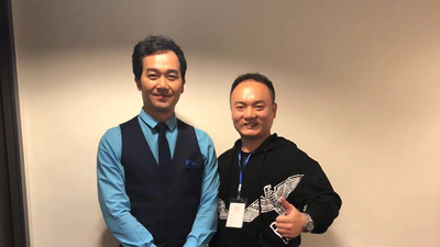 校长林羽龙与央视主持人曹震合影